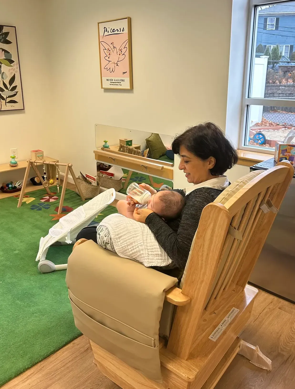 montessori infant with guide