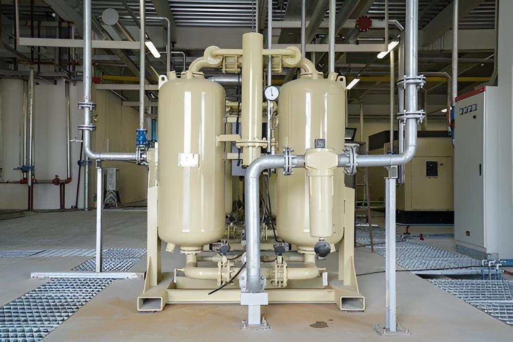 A Room With A Lot Of Pipes And Tanks In It — Wide Bay Hydraulics in Hervey Bay, QLD