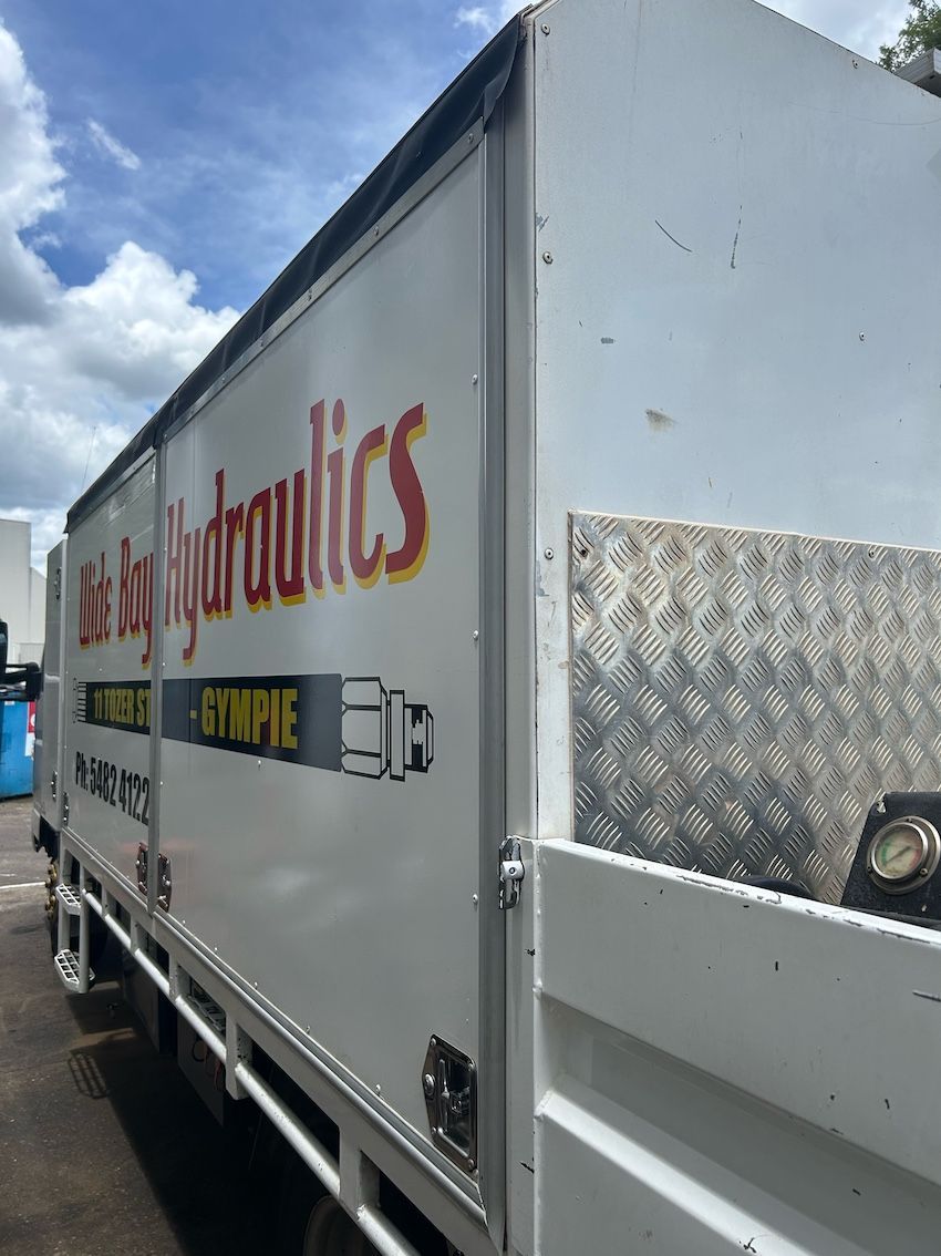 The Side Of Wide Bay Hydraulics Truck — Wide Bay Hydraulics in Tin Can Bay, QLD