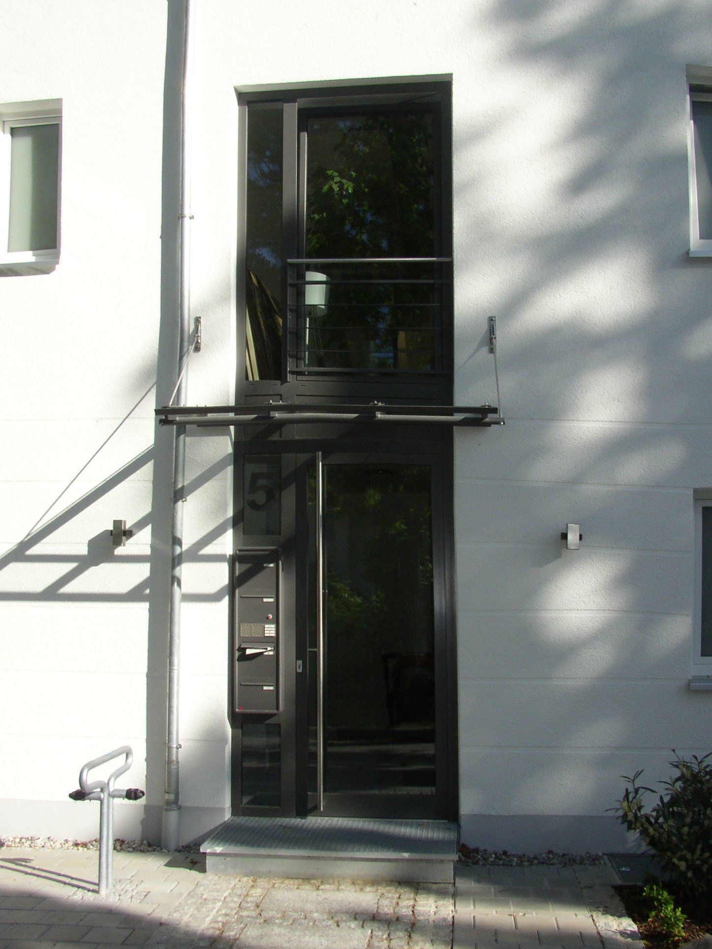 A white building with the number 5 on it