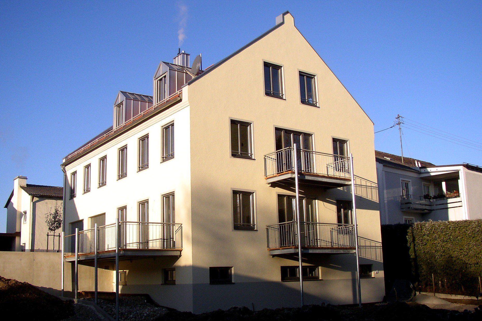 A large building with balconies on the side of it