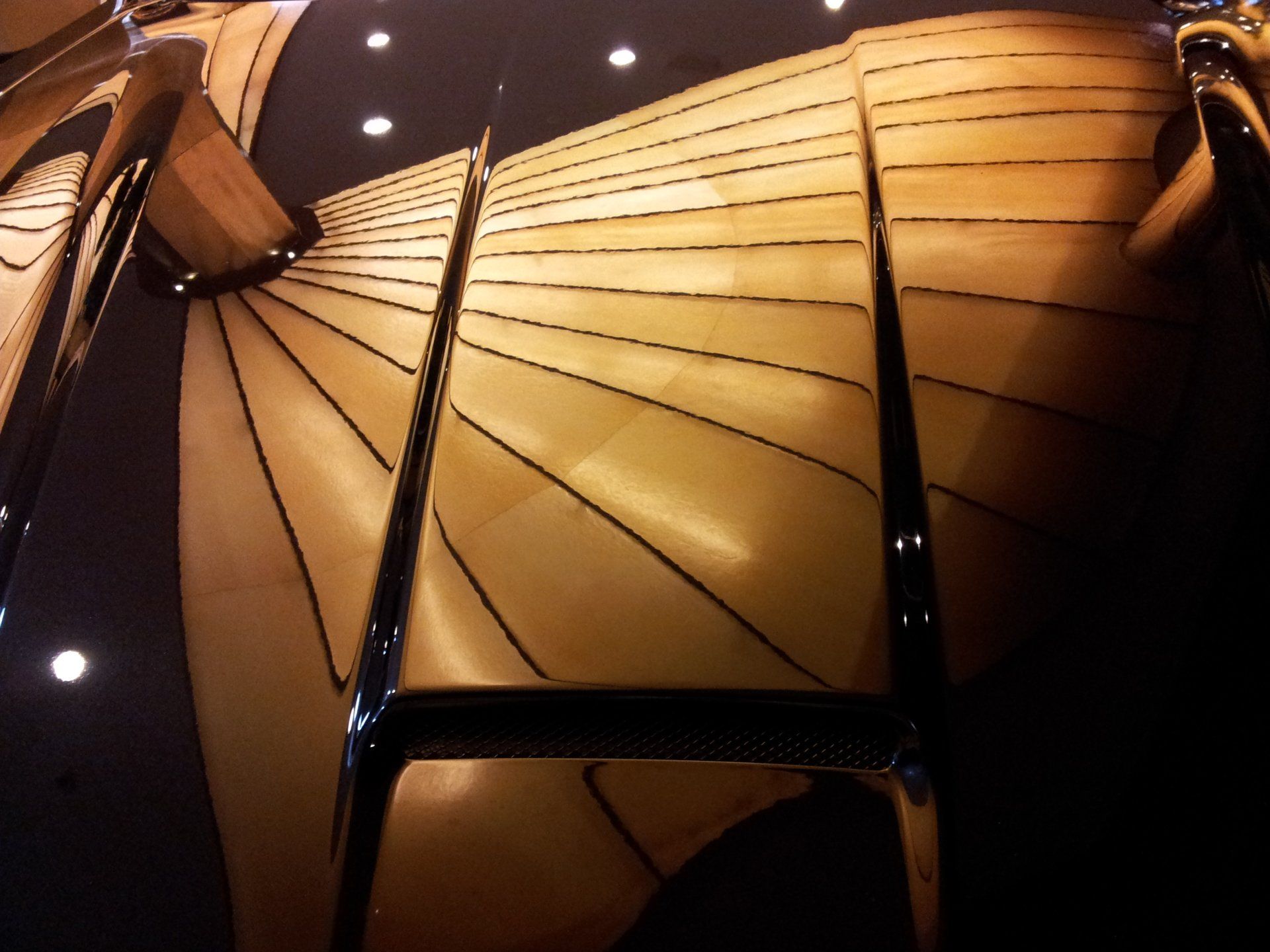 A close up of a spiral staircase in a dark room