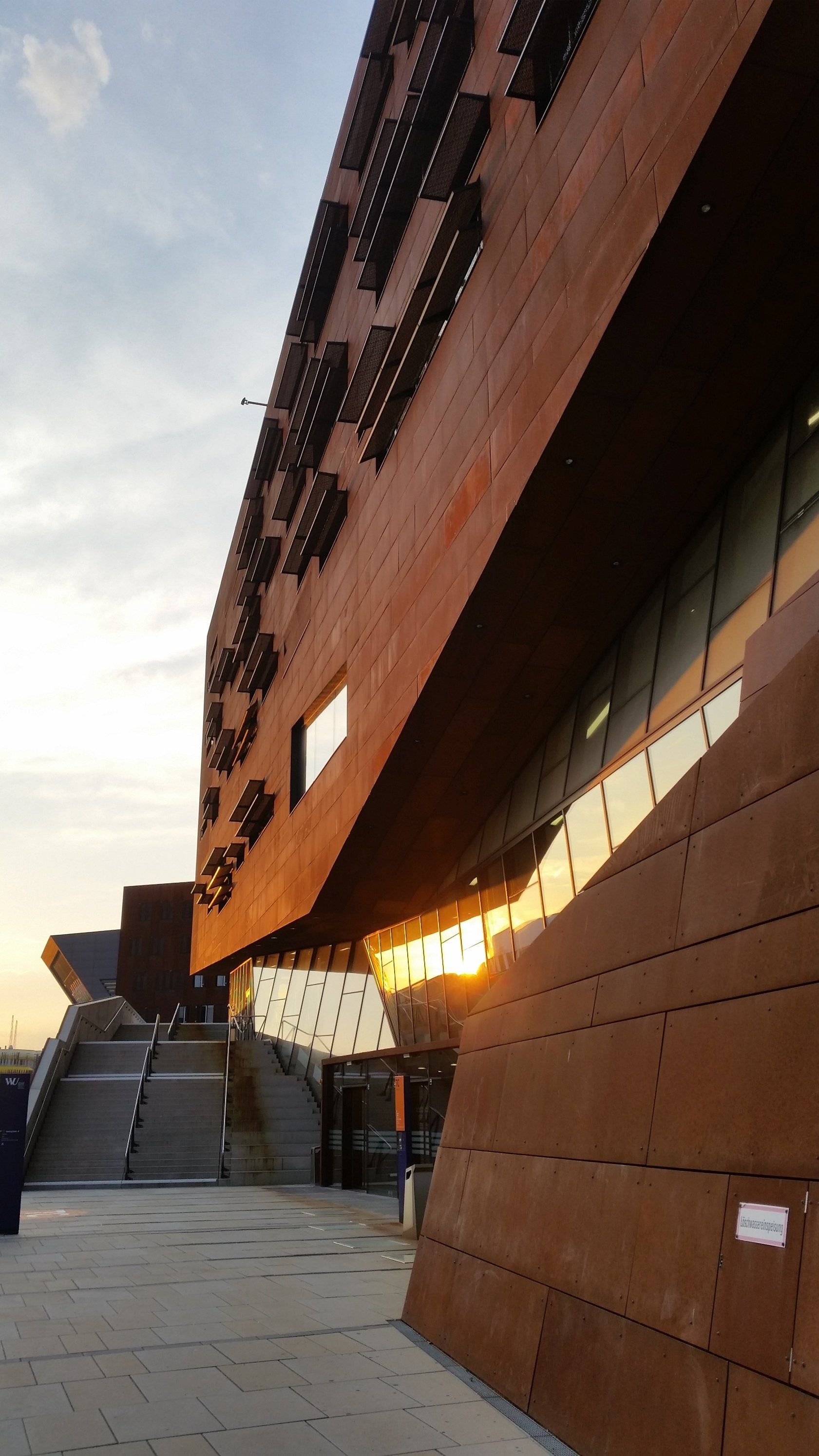 The sun is shining through the windows of a building