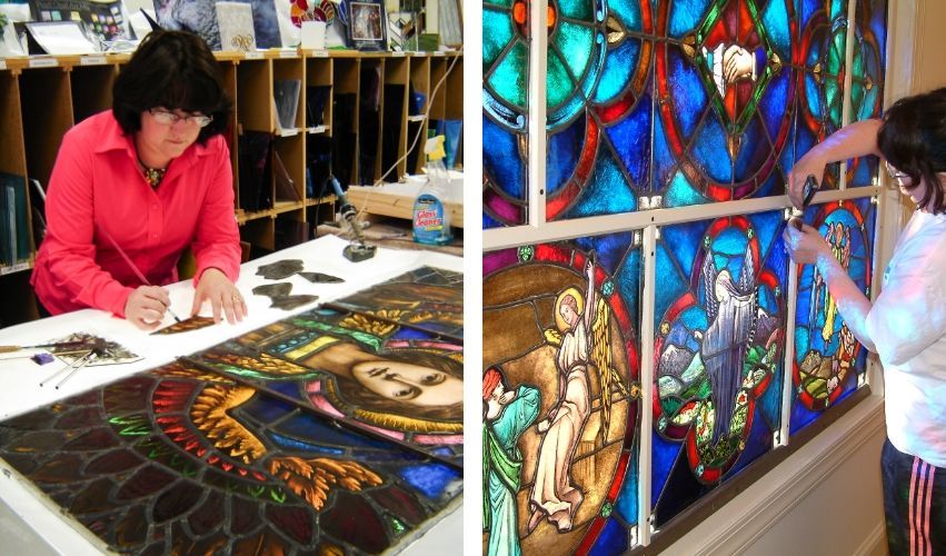 Two women are working on a stained glass window