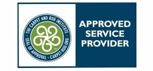 Logo of The Carpet and Rug Institute "Approved Service Provider" in white text on a blue background.
