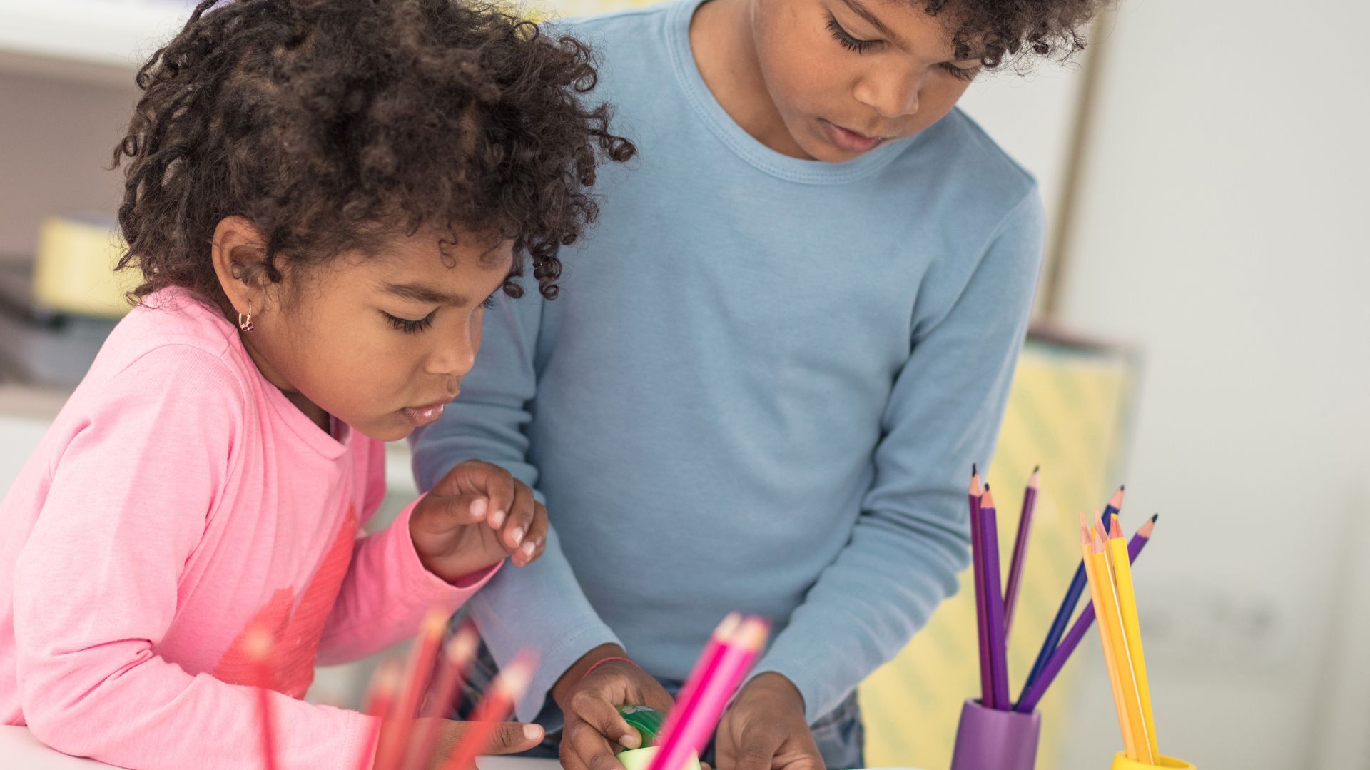 children expressing through creative drawing