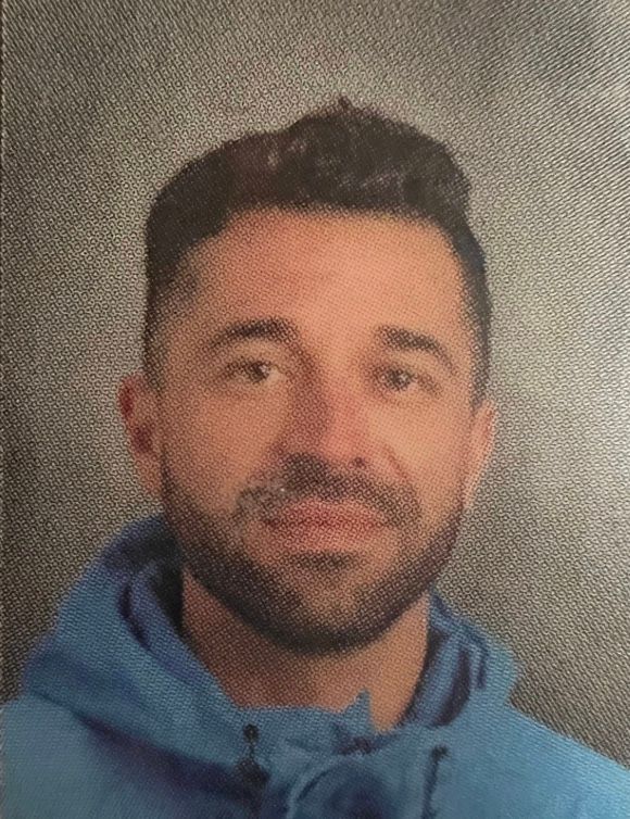 Logo for The Latchkey Alternative Center with children atop books, sun, keys, and a house illustration.