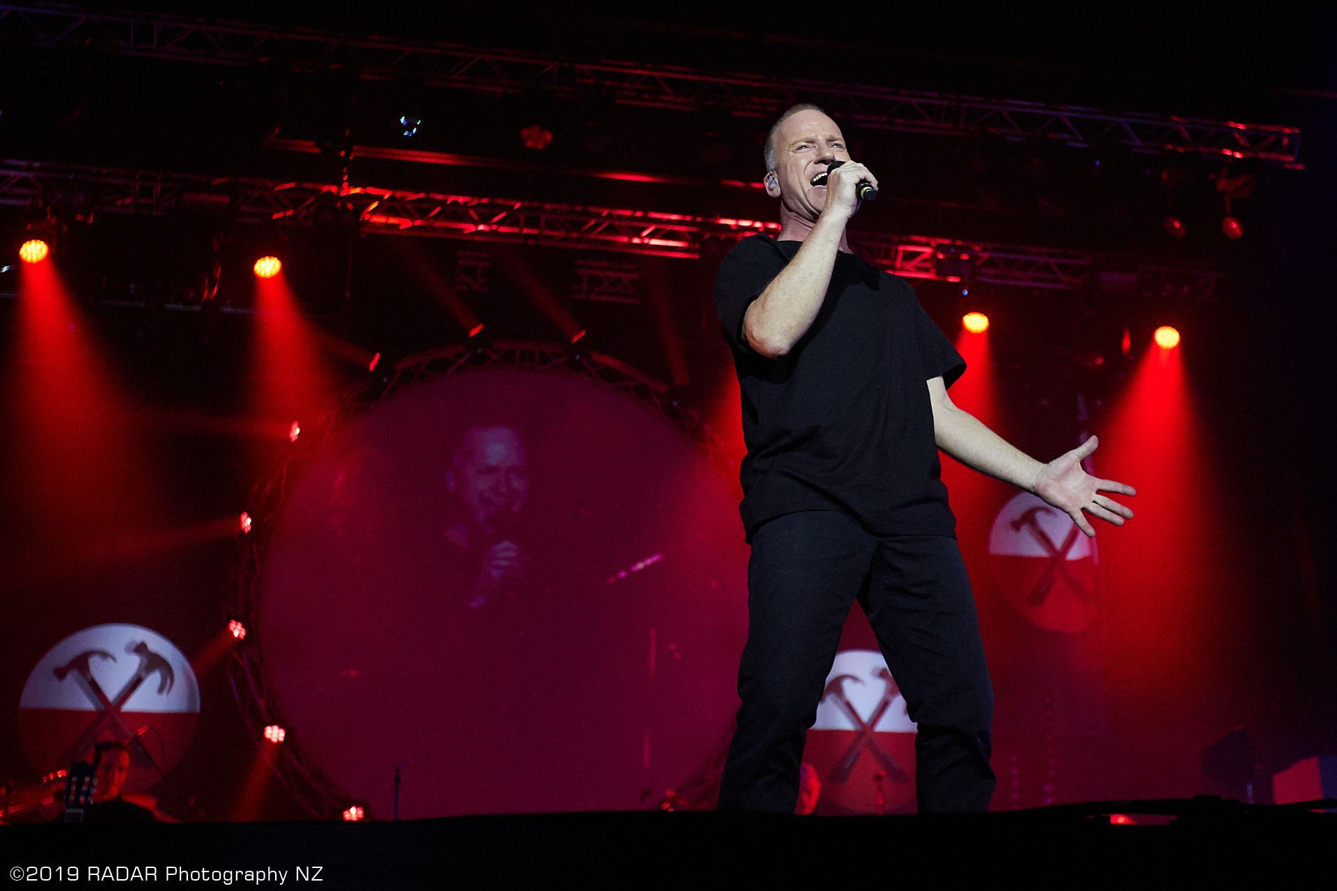 Music concert lighting and visuals synchronised with live performance