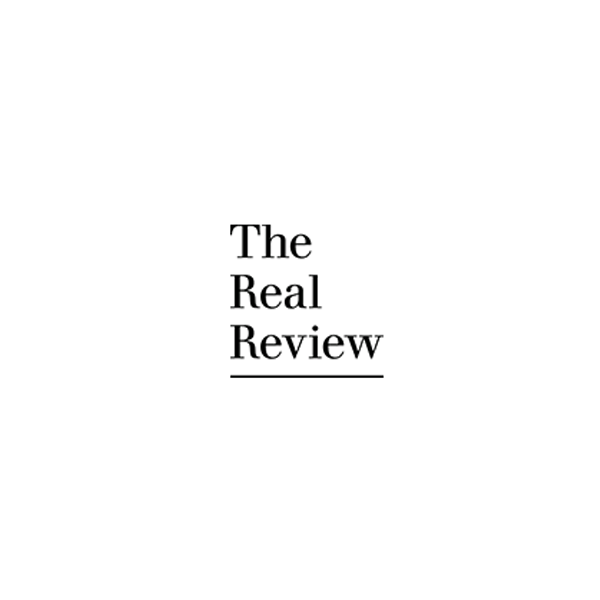The Real Review logo, black text on white background.