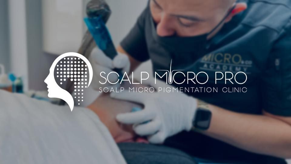 A man is getting a tattoo on another man 's arm.