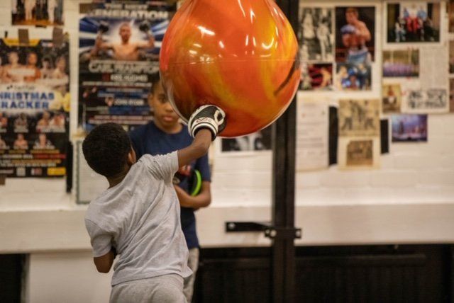 Selby Amateur Boxing Club participant punching a water punching bag