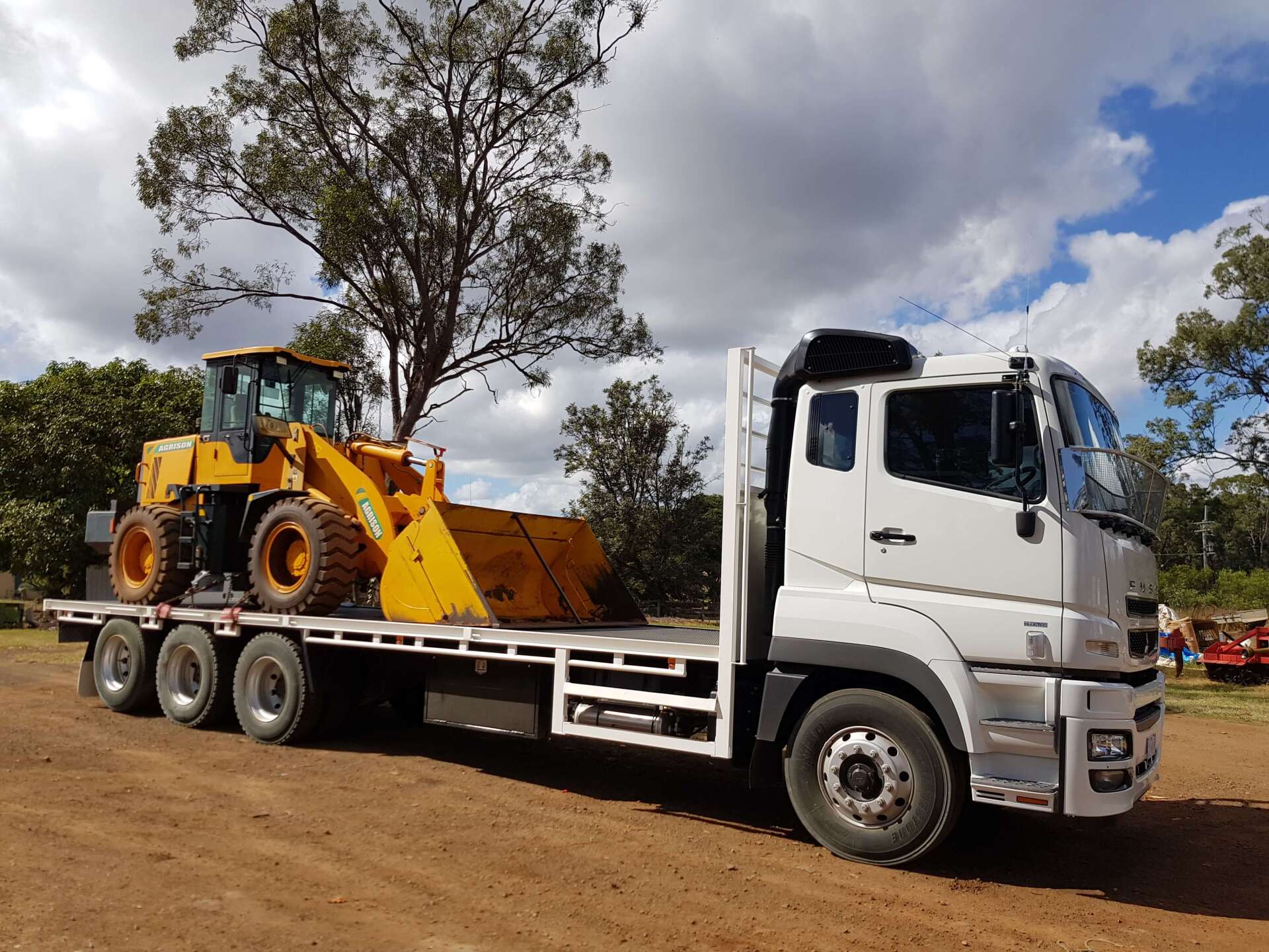 Company Truck with Tractor — Deliveries in Gin Gin, QLD
