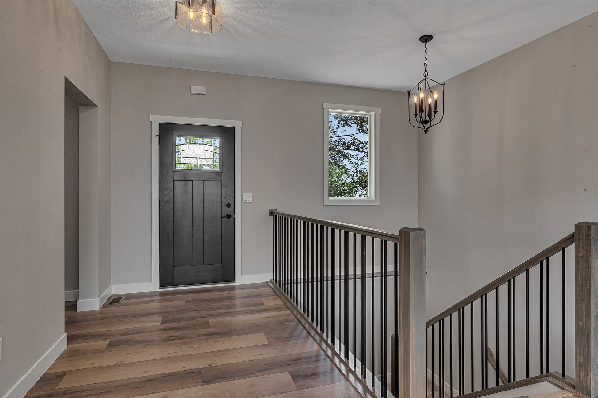 There is a staircase leading up to the second floor of a house.