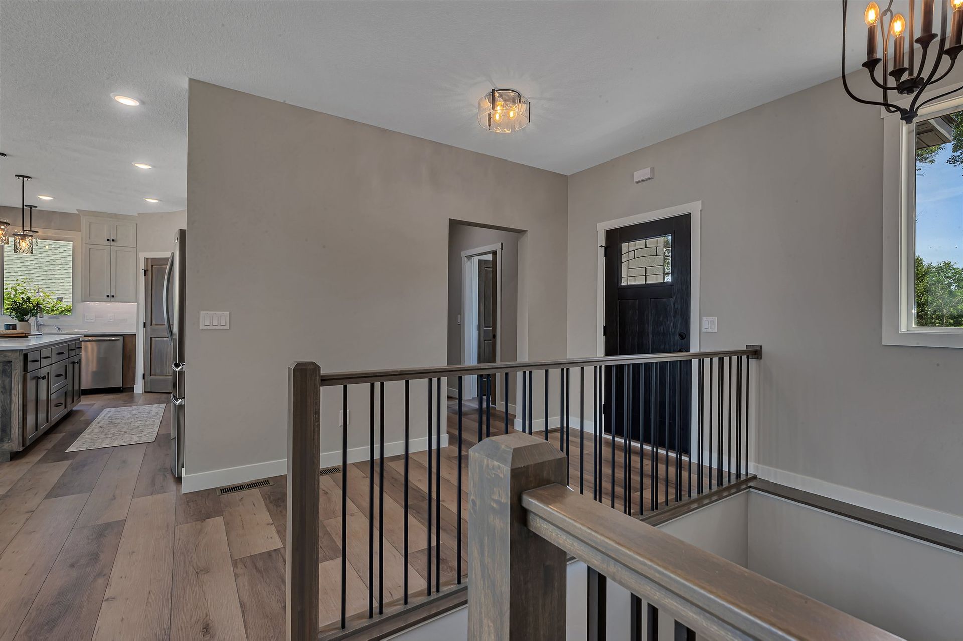 There is a staircase leading up to the second floor of a house.