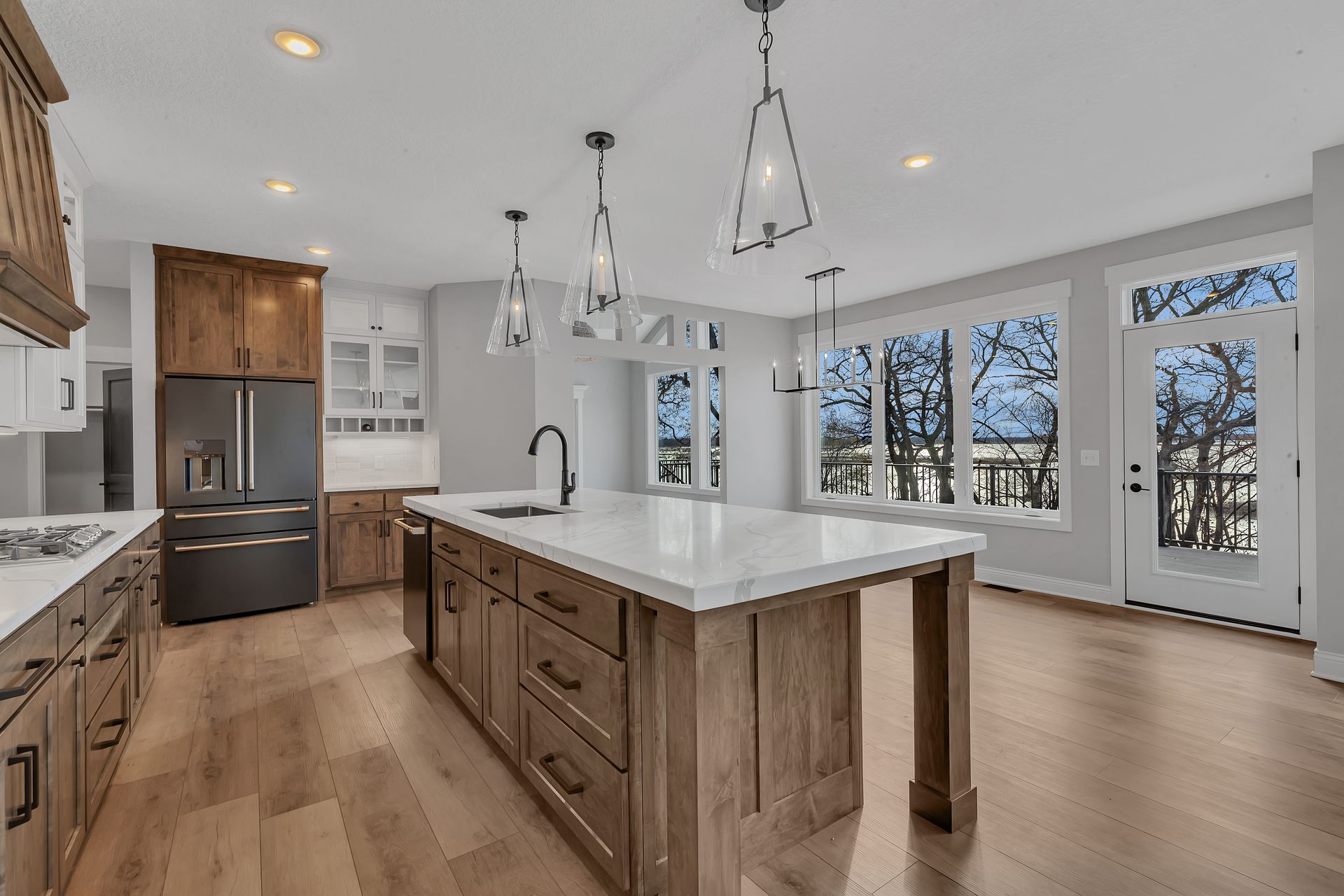 There is a large island in the middle of the kitchen.