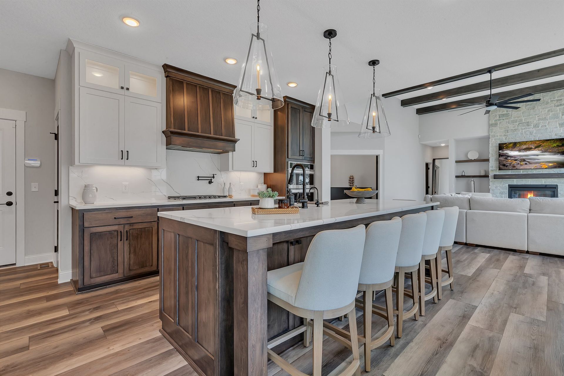 There is a large island in the middle of the kitchen.