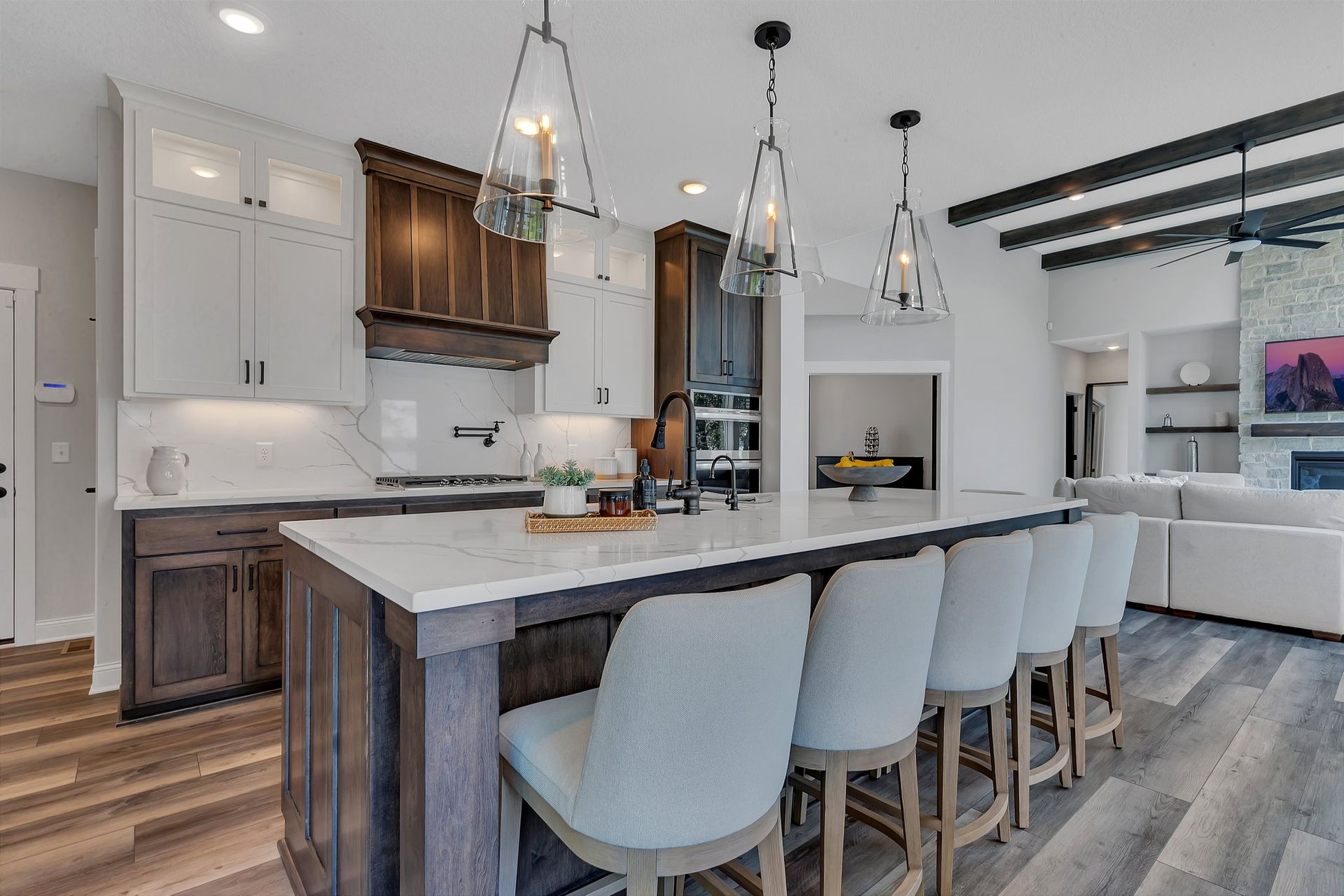 There is a large island in the middle of the kitchen.