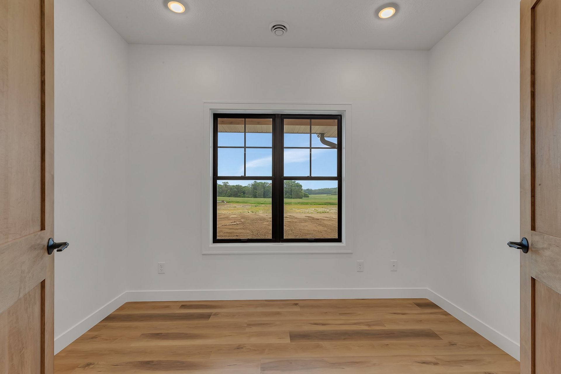 There is a large window in the middle of the room.