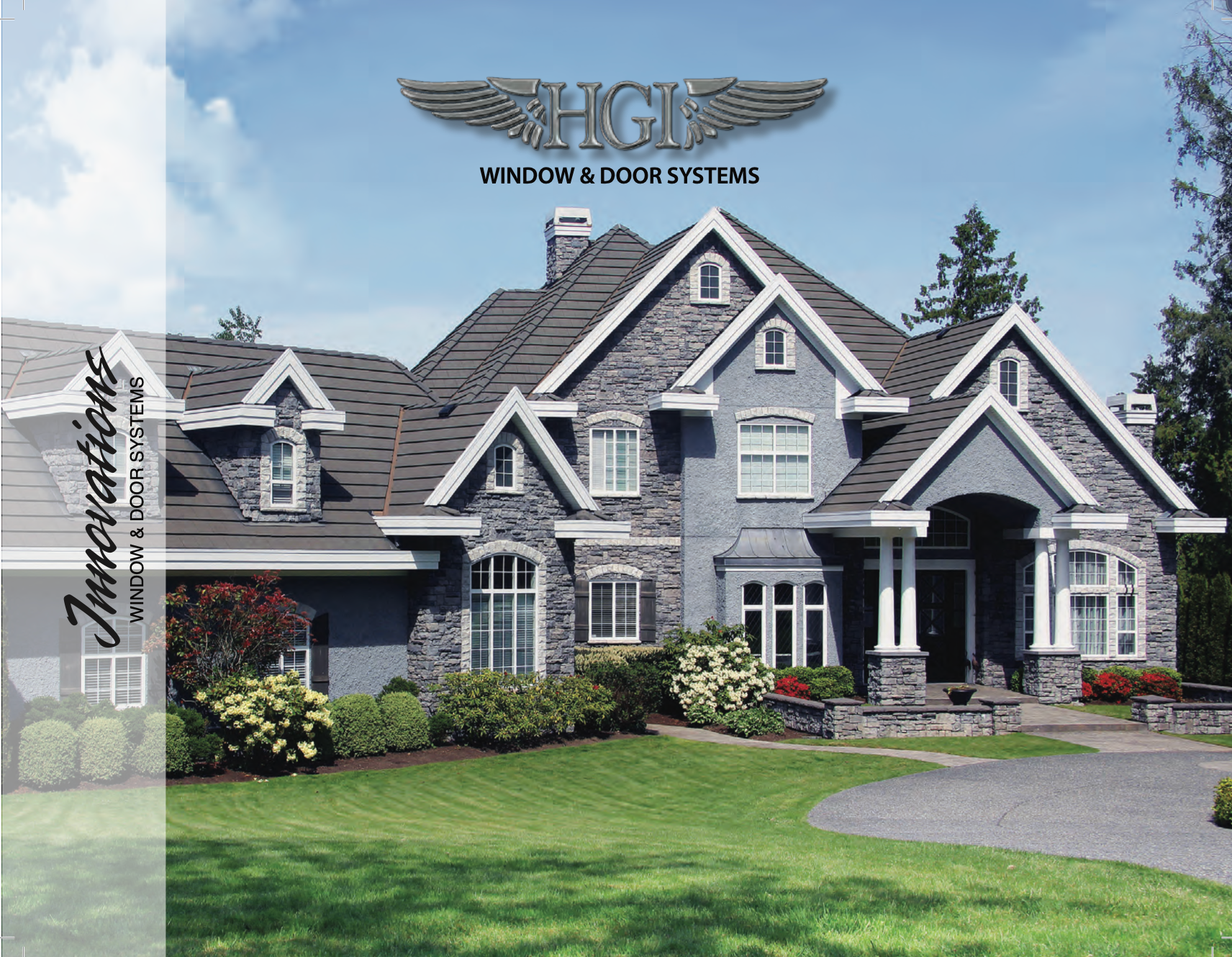 A large house with a gray roof and white trim