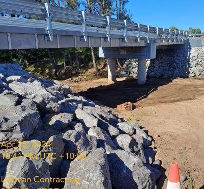 A Pile of Rocks Under a Bridge With a Cone in the Foreground — Lohman Contracting in Emerald, QLD
