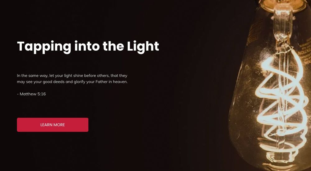 A lit lightbulb with text 