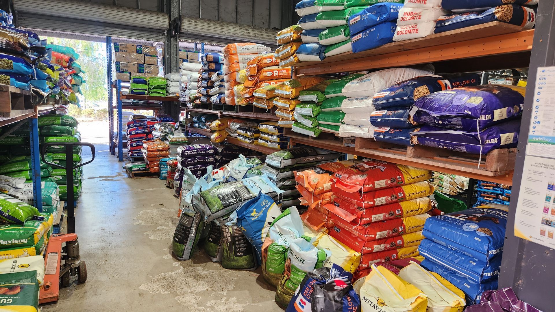 A Warehouse Filled With Lots Of Bags Of Food — Cooroy Produce In Cooroy, QLD