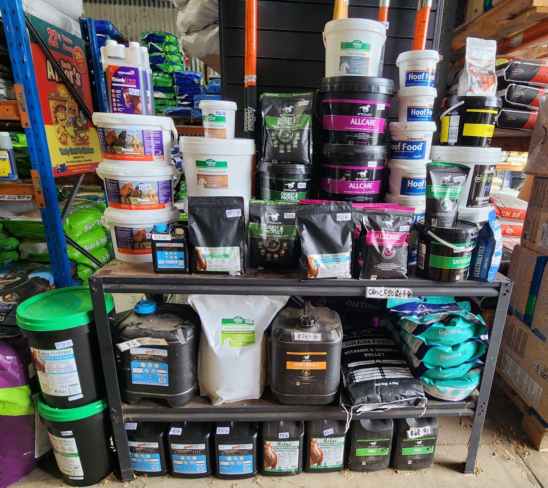 A Stack Of Containers With One That Says Muscle Xl — Cooroy Produce In Cooroy, QLD