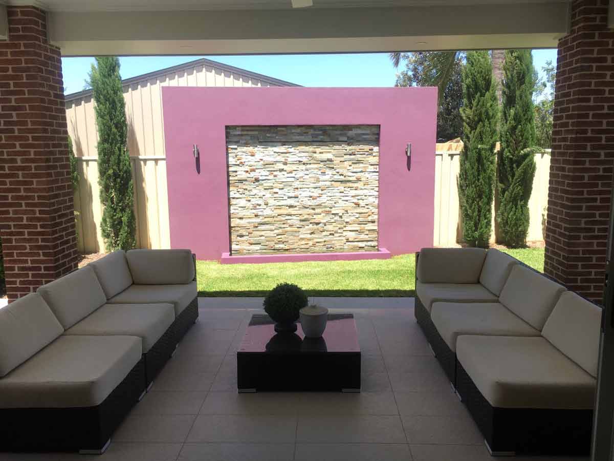 back patio and pink wall