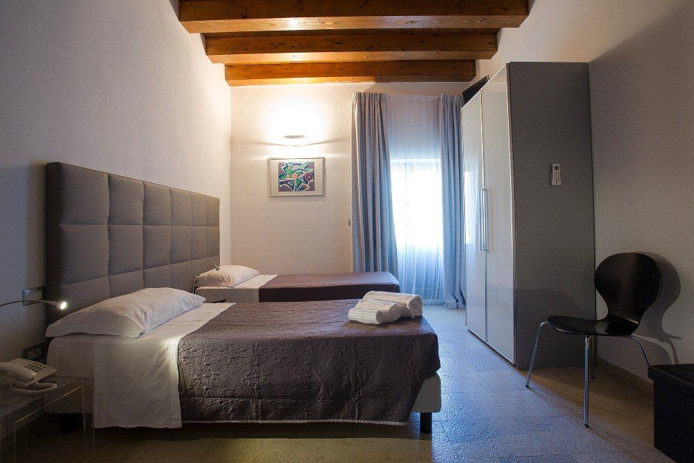 Camera con travi a vista