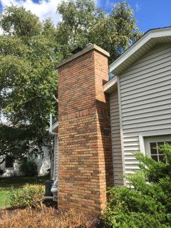 A Newly Cleaned Chimney — Eagle & East Troy, WI — R & R Fireplace And Chimney