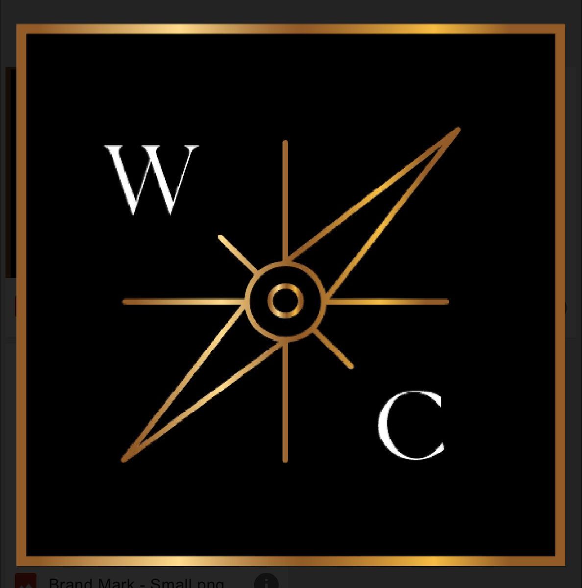 A compass with the letter w and c on it