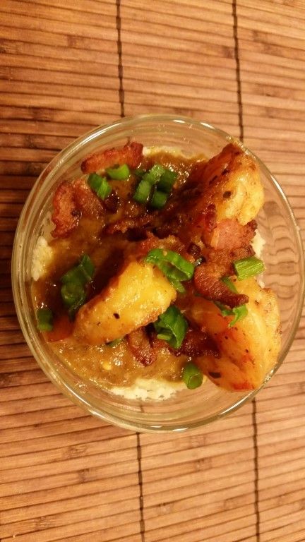 A close up of a bowl of food on a table.