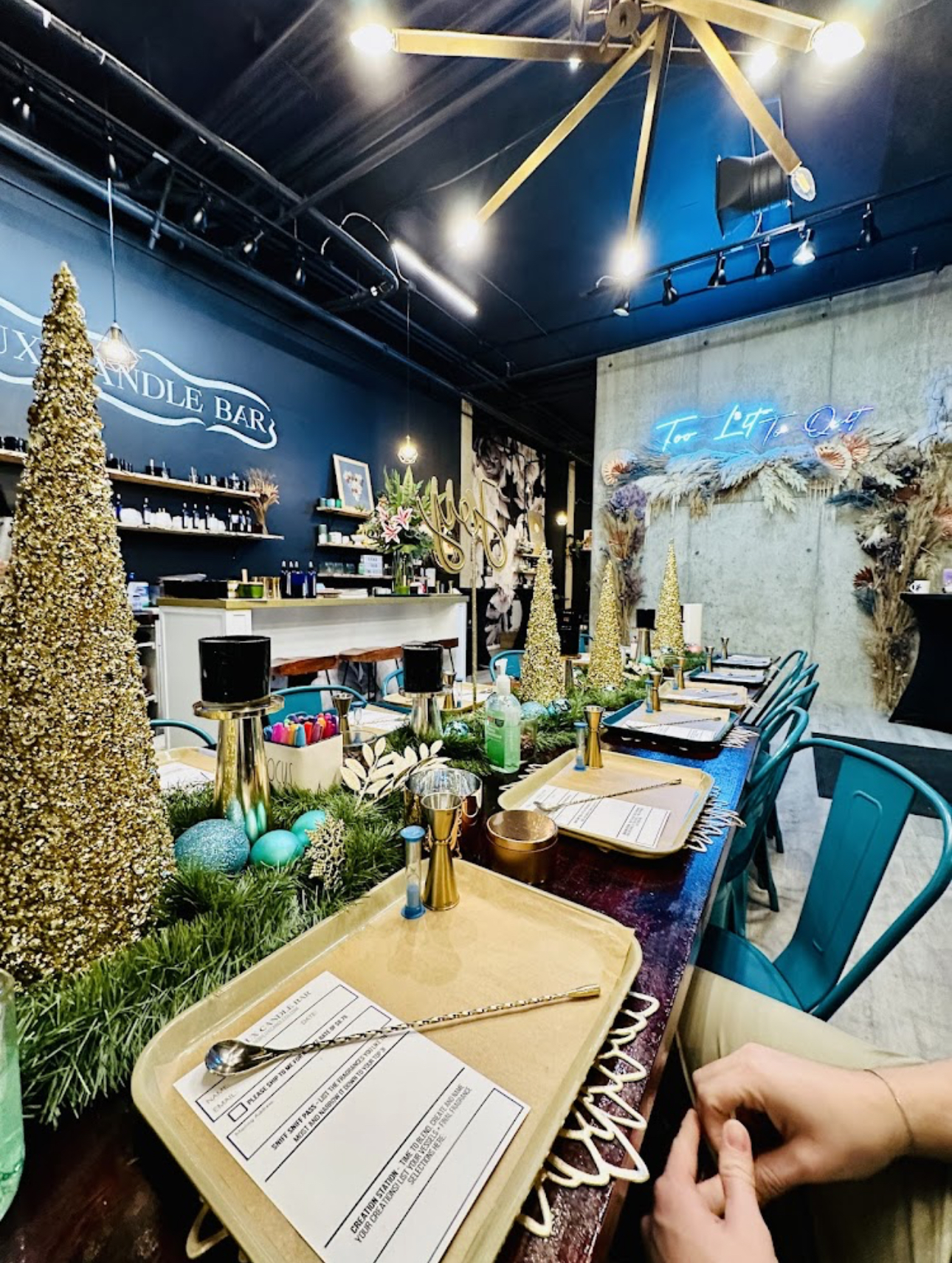 A person is sitting at a table with a tray of food