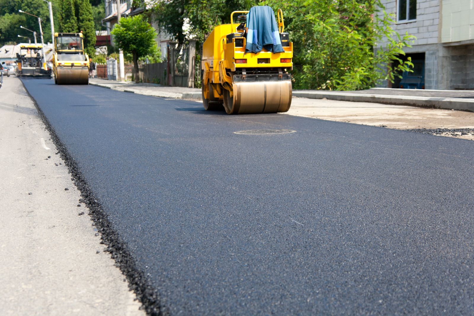 The inside of a moving truck filled with boxes and blankets.