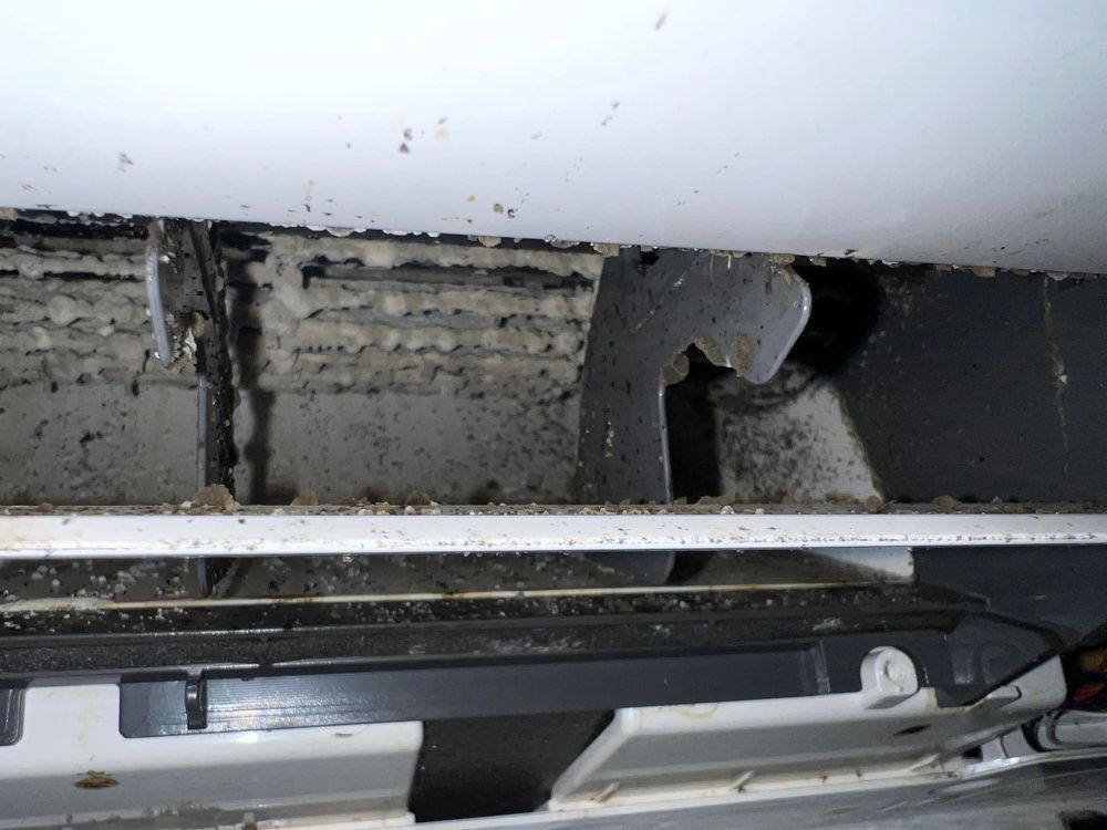 A Close Up of a Dirty Air Conditioner With a Lot of Dust on It — Air-Con Cleaning Specialists in Cairns City, QLD