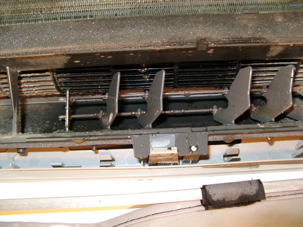 A Close Up of a Dirty Air Conditioner Fan — Air-Con Cleaning Specialists in Smithfield, QLD