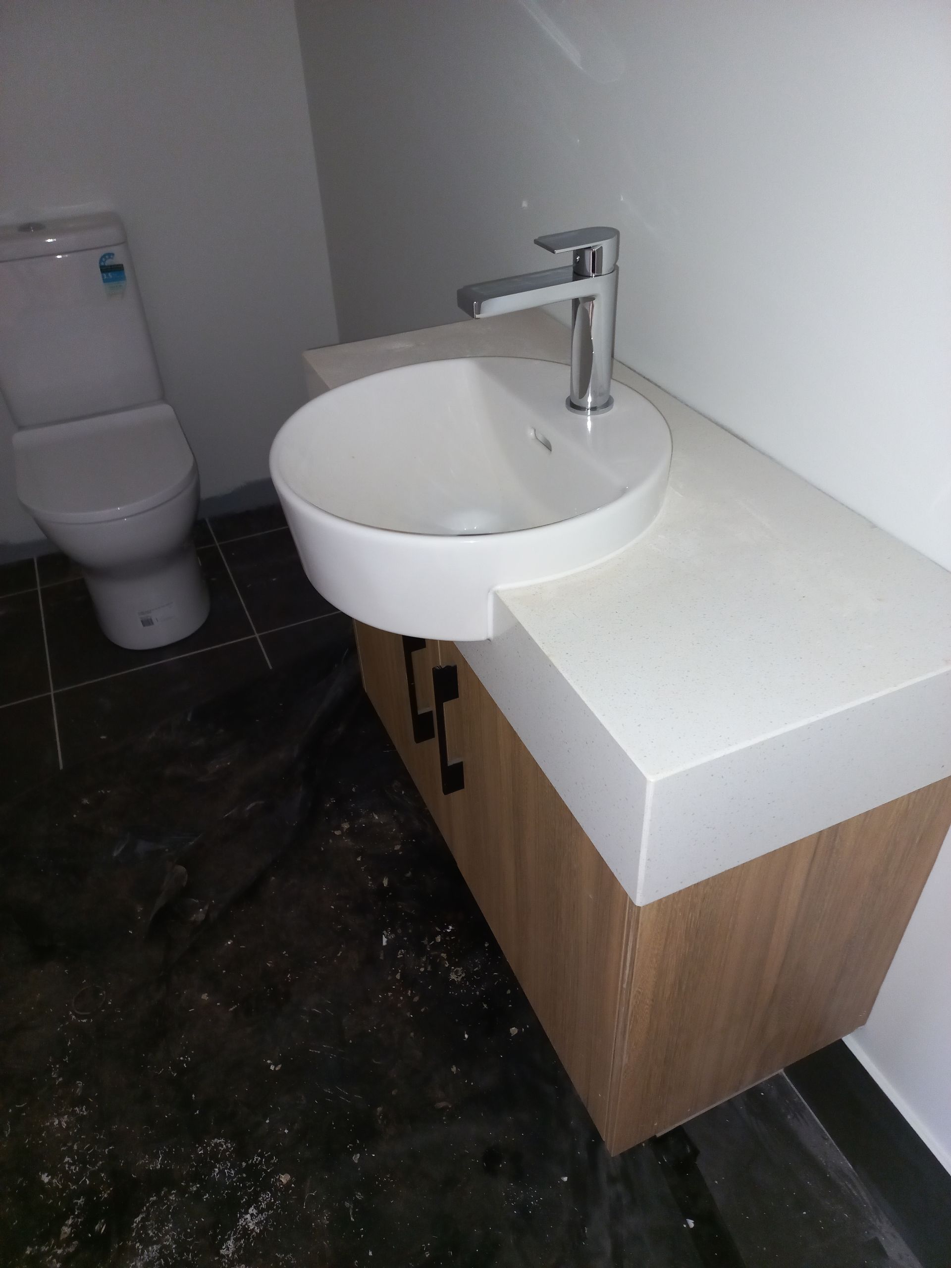 A Bathroom With a Sink and Toilet in It — Bevan Plumbing in South Lismore, NSW