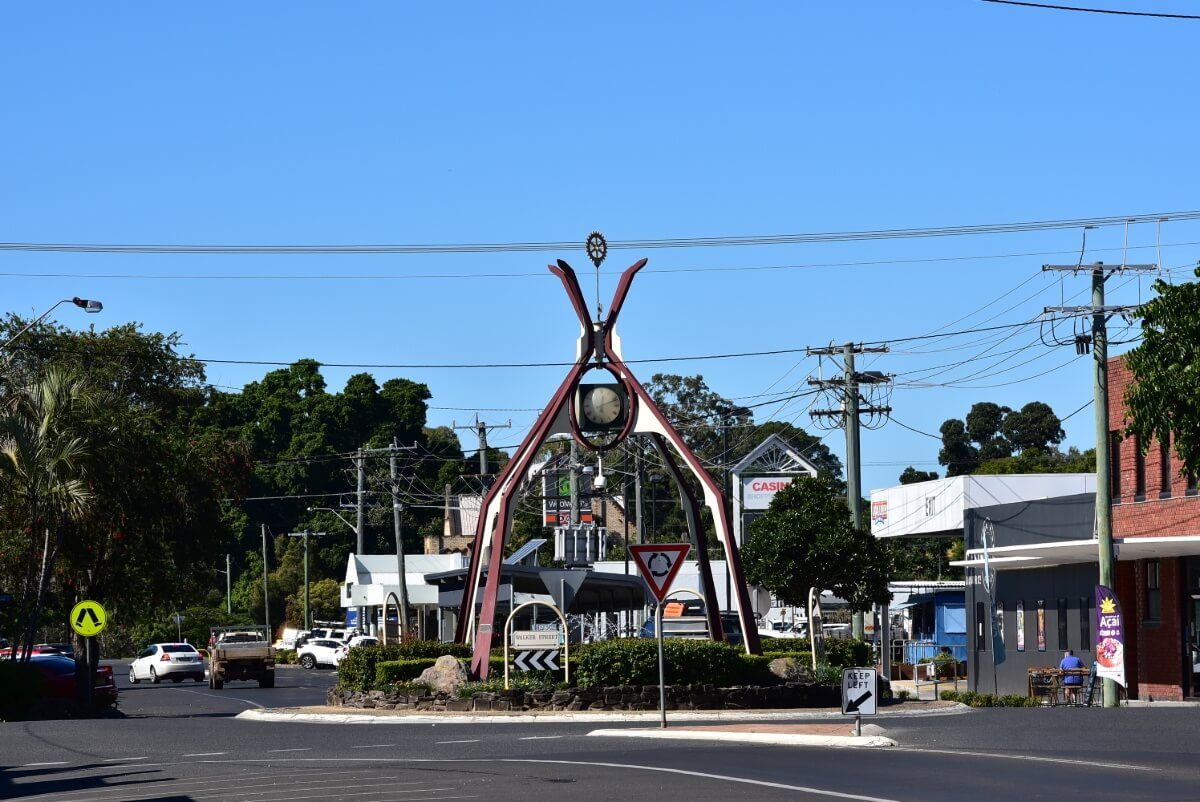 A Clock Tower is in the Middle of a Street in a Small Town — Bevan Plumbing in Casino, NSW