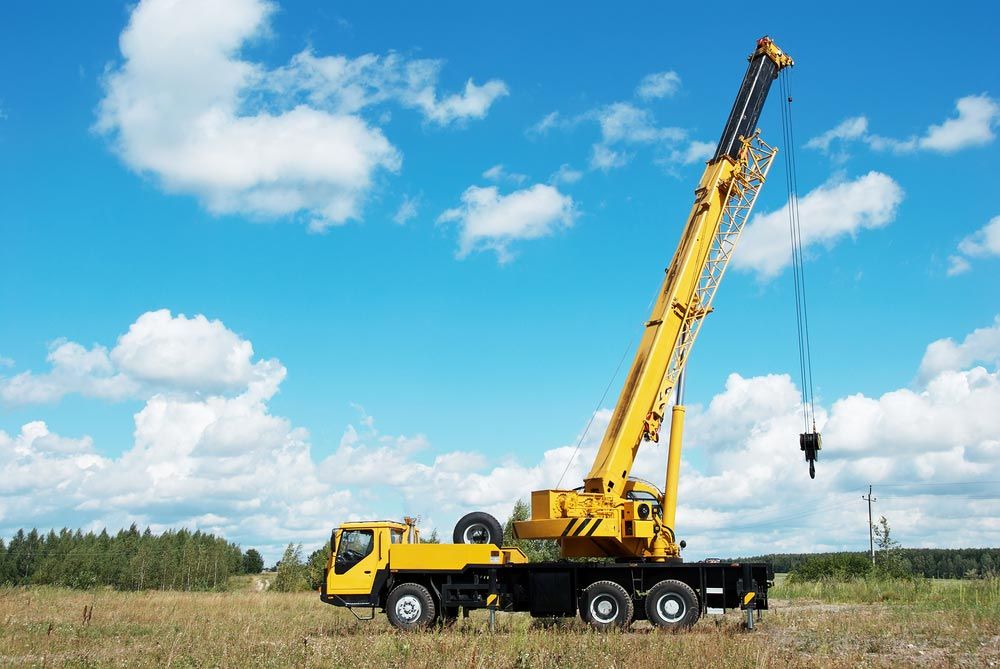 Yellow Automobile Crane With Rise — Lifting Equipment in Gympie, QLD