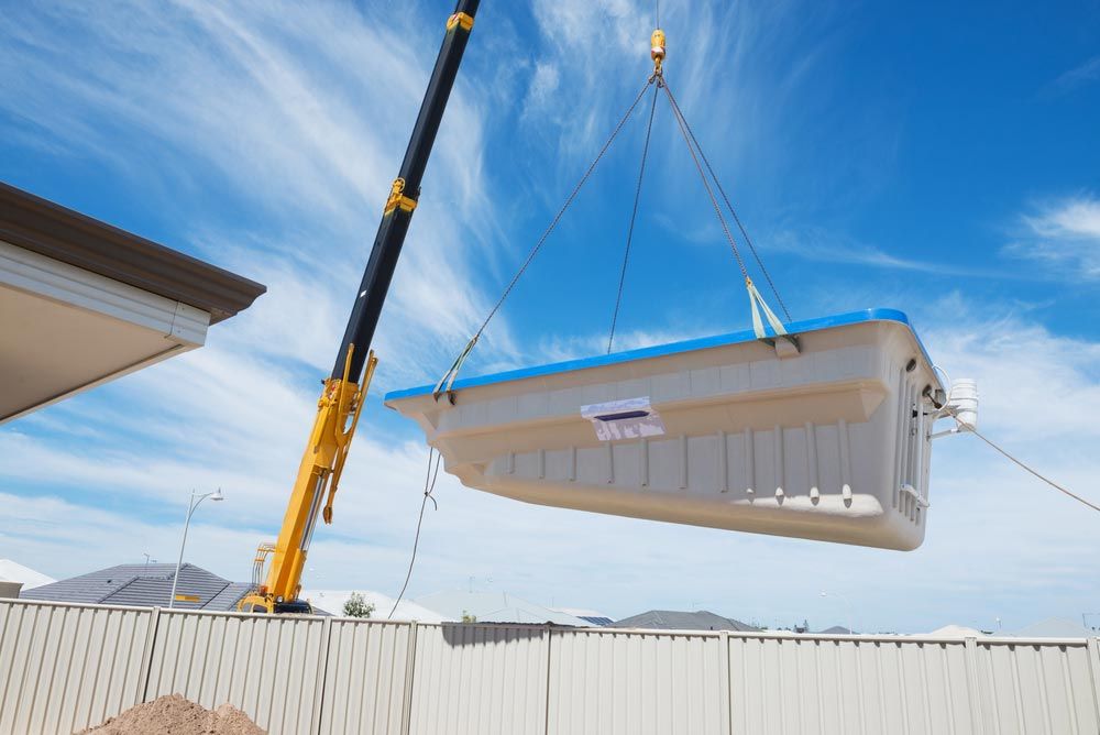 Crane Work And In Swimming Pool — Lifting Equipment in Caboolture, QLD