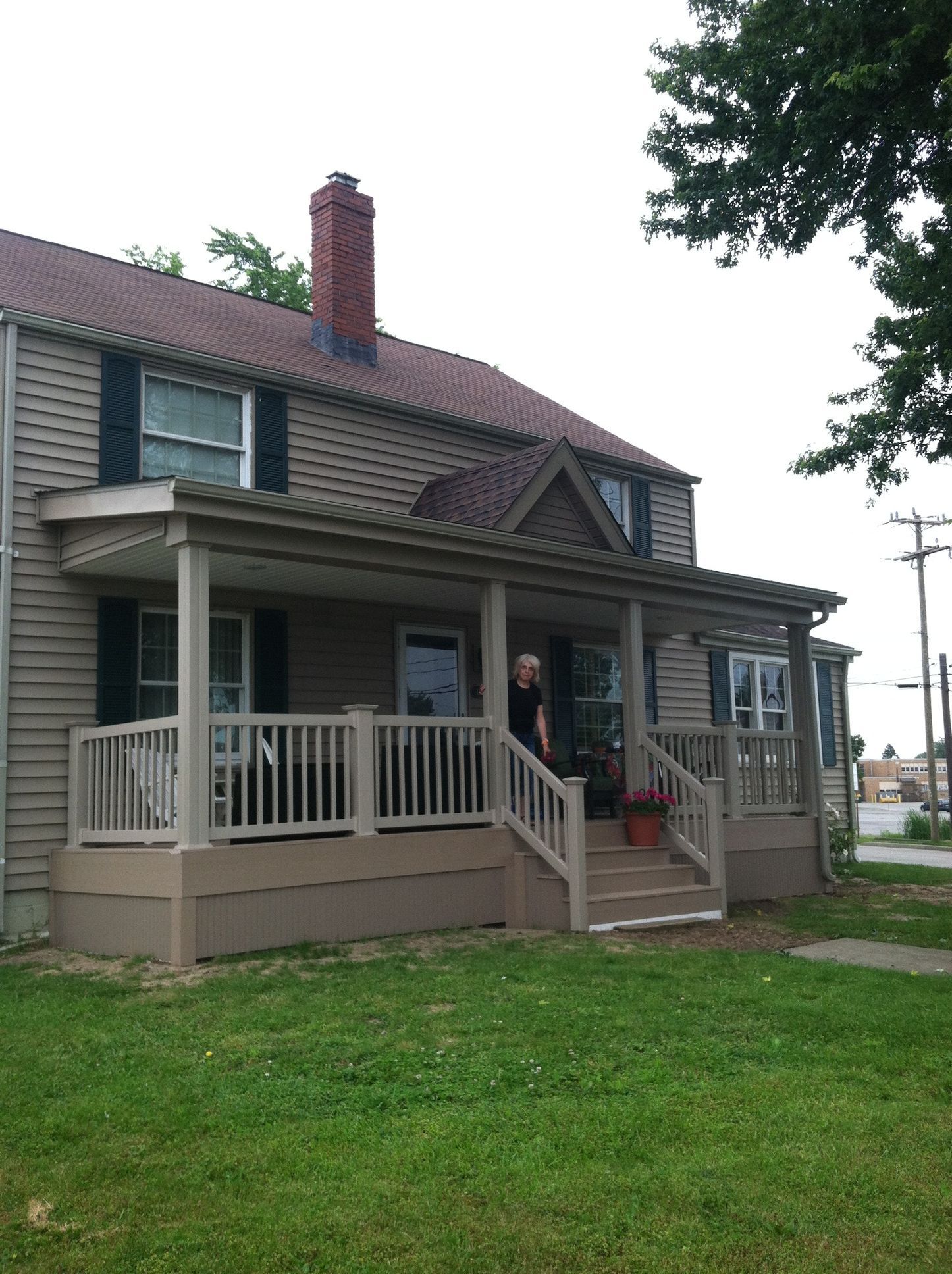 A house with a large porch and stairs