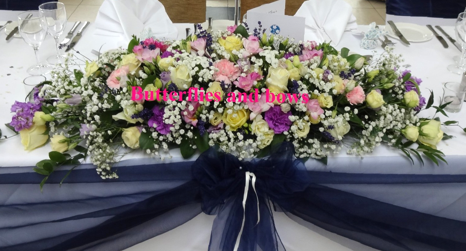 Wedding flowers top table display