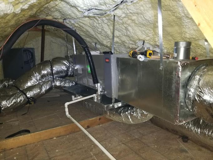 A room with a lot of pipes coming out of it.