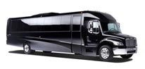 Black party bus on a white background. The bus has tinted windows, and shiny black paint.