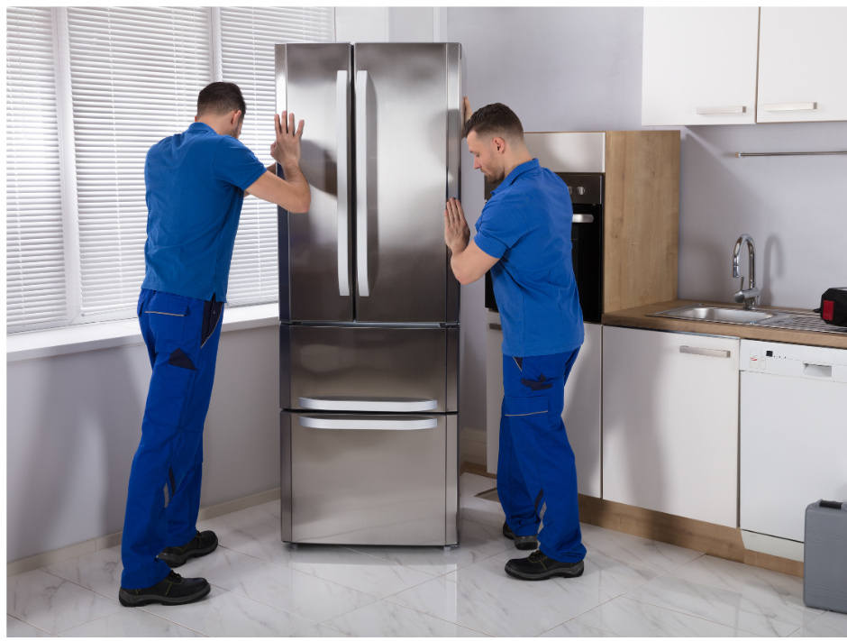 picture of two handymen positioning stainless refrigerator