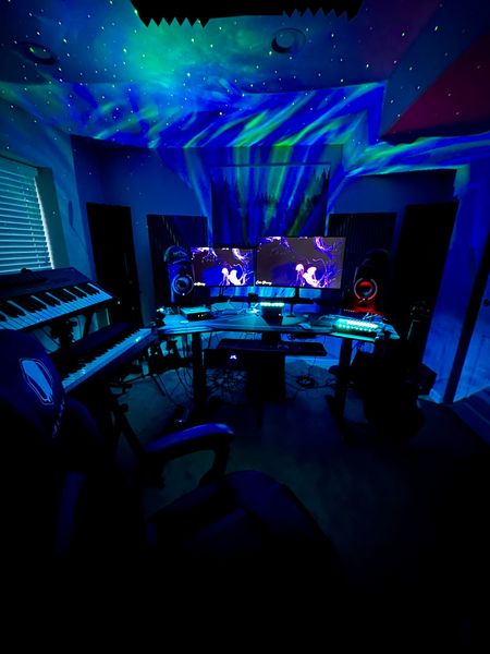 A dark room with a lot of lights on the ceiling.