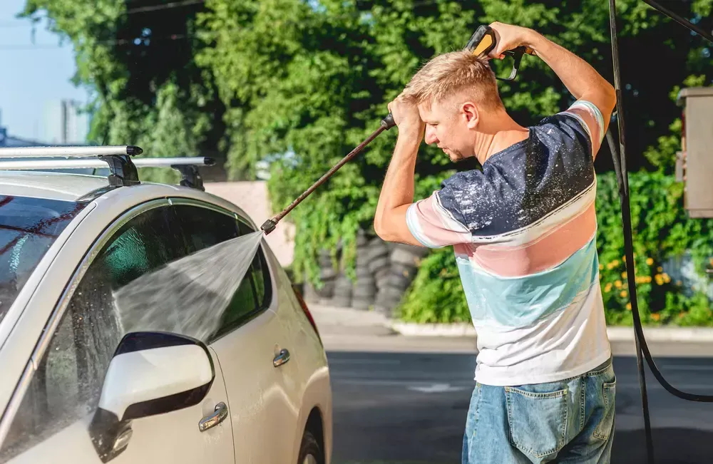 Man washing his car