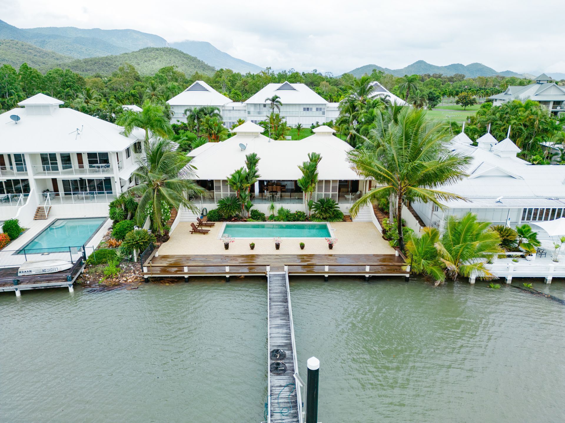 An Aerial View of a Large House With a Swimming Pool — MDSR Group in Manunda, QLD