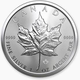 A silver coin with a maple leaf on it.