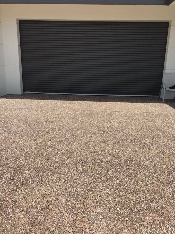 Garage Pebble Pathway — Olympic Concreting & Construction in Karama, NT